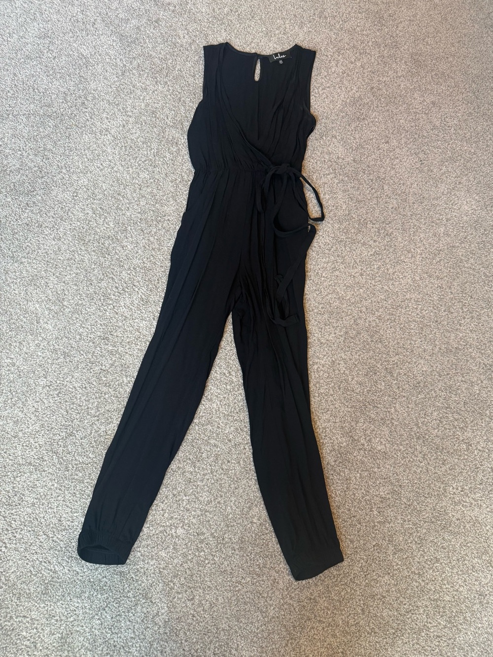 Lulu's Black Sleeveless Wrap-Front Jumpsuit with Tie Waist